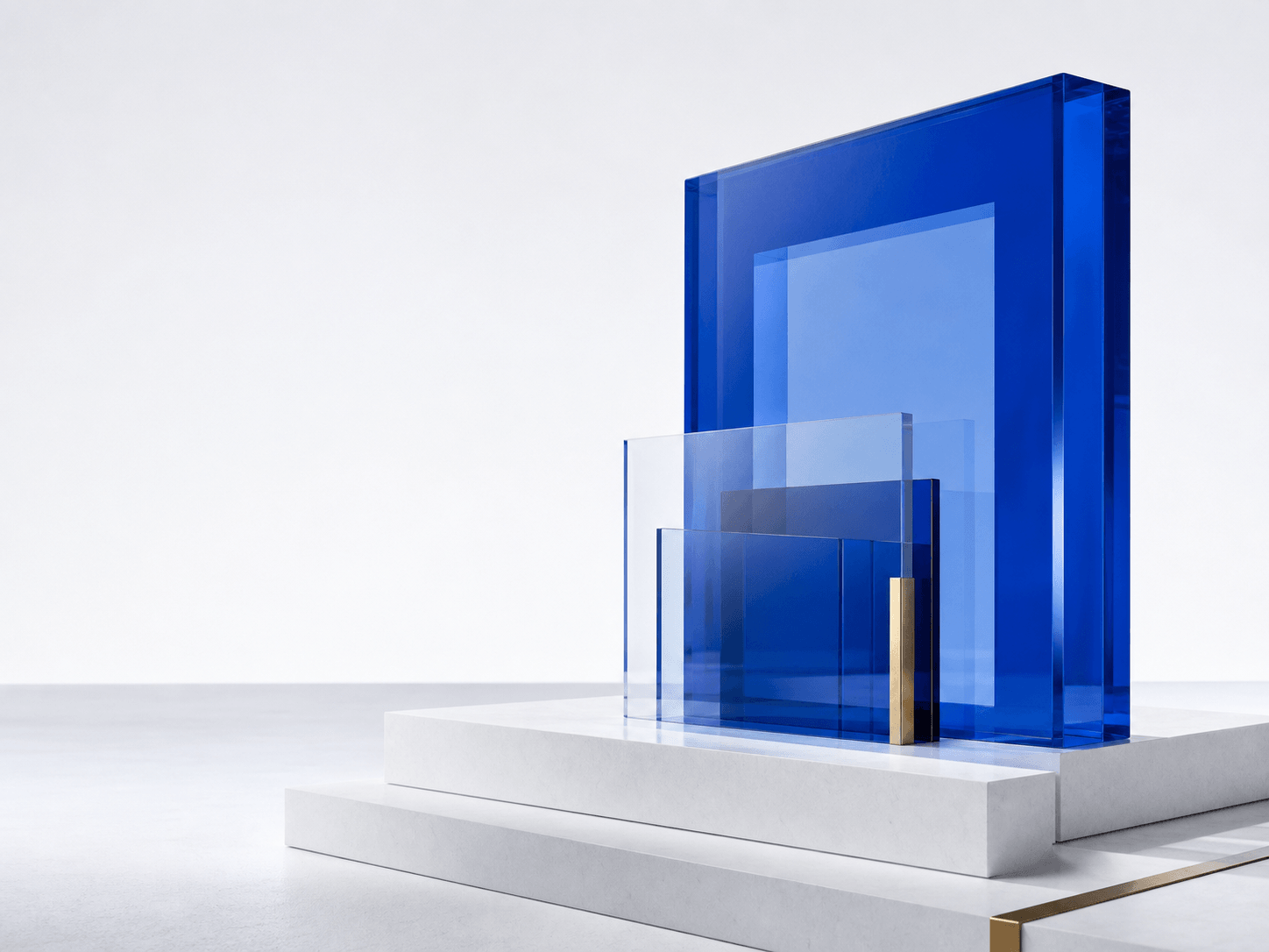 Cobalt glass portal rising from a precise white architectural plinth
