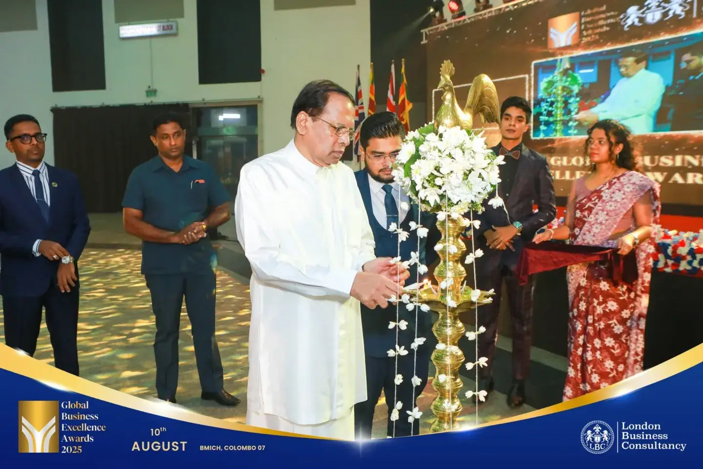 Ceremonial lamp lighting at a Global Business Excellence Awards programme