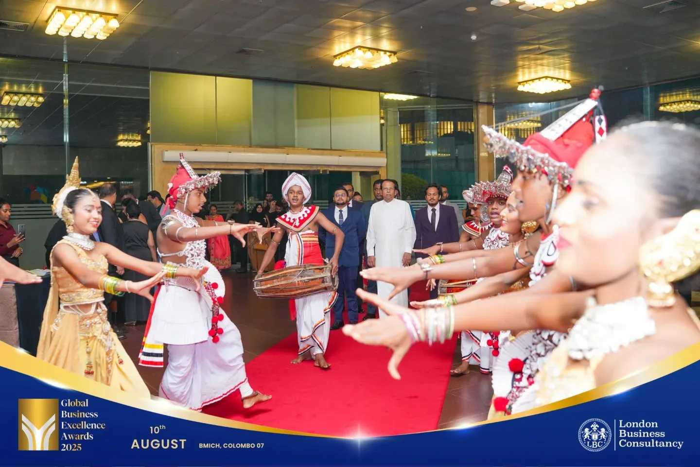 Traditional dancers welcoming guests at a Global Business Excellence Awards ceremony