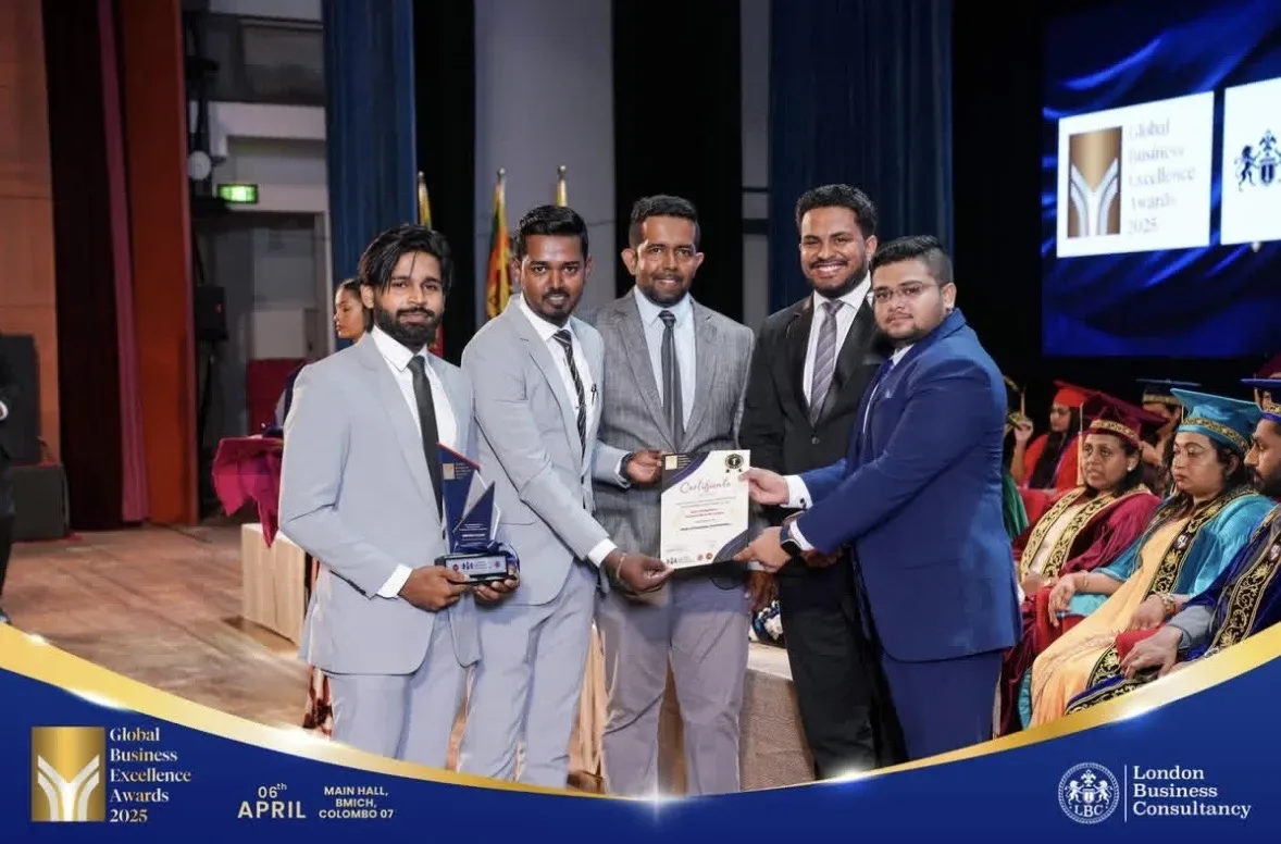 Global Business Excellence Awards recipients and representatives holding an award and certificate