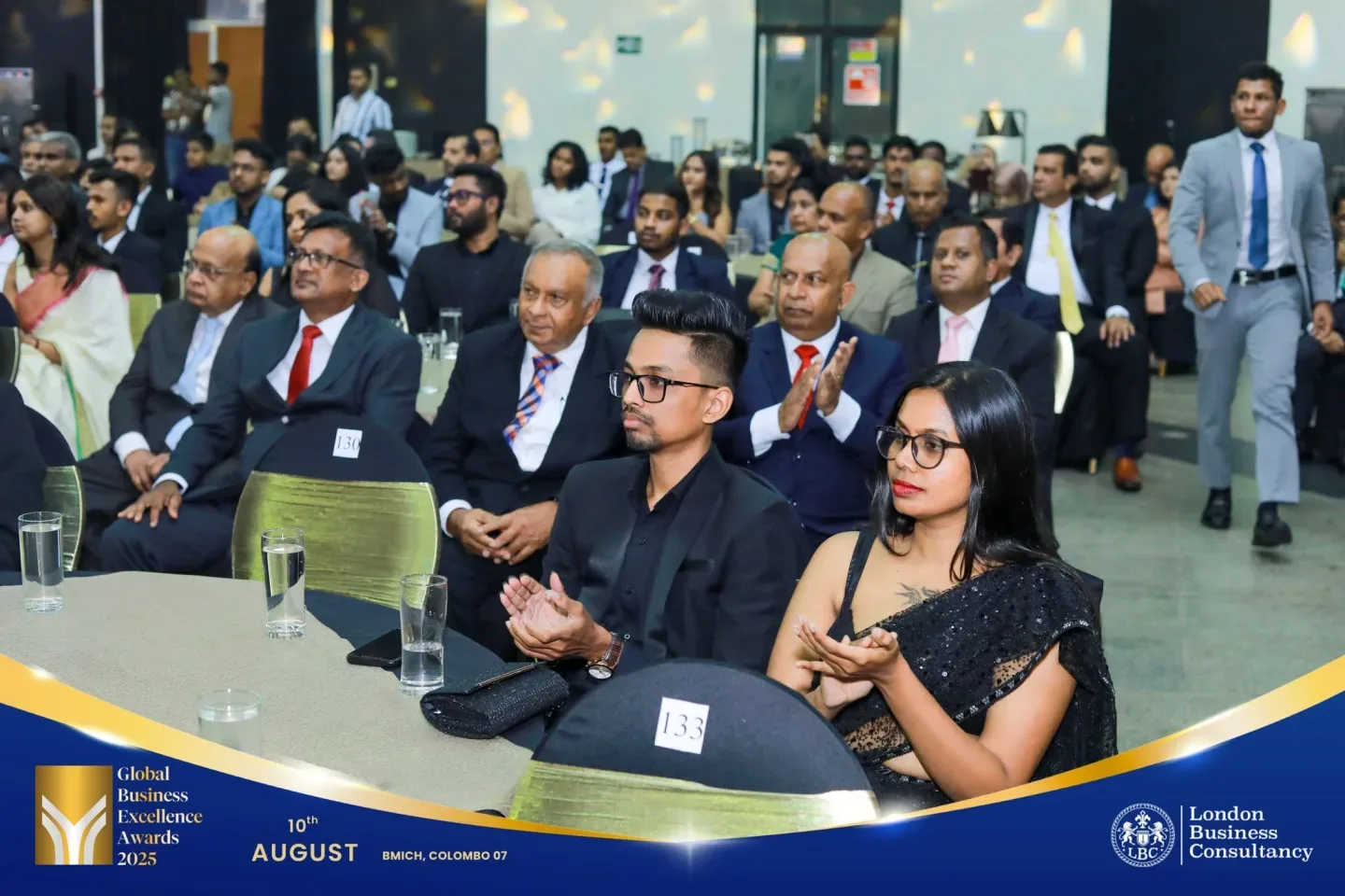 Guests seated together at a Global Business Excellence Awards ceremony